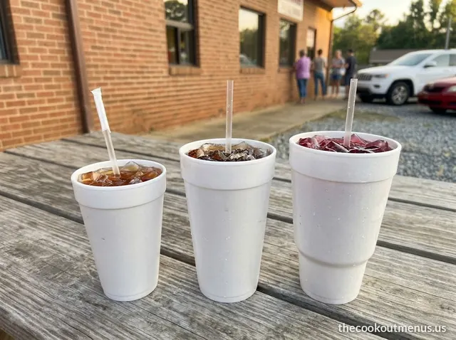 Fountain drinks on the Cook Out menu in three foam cup sizes: sweet tea, cola and cherry soda