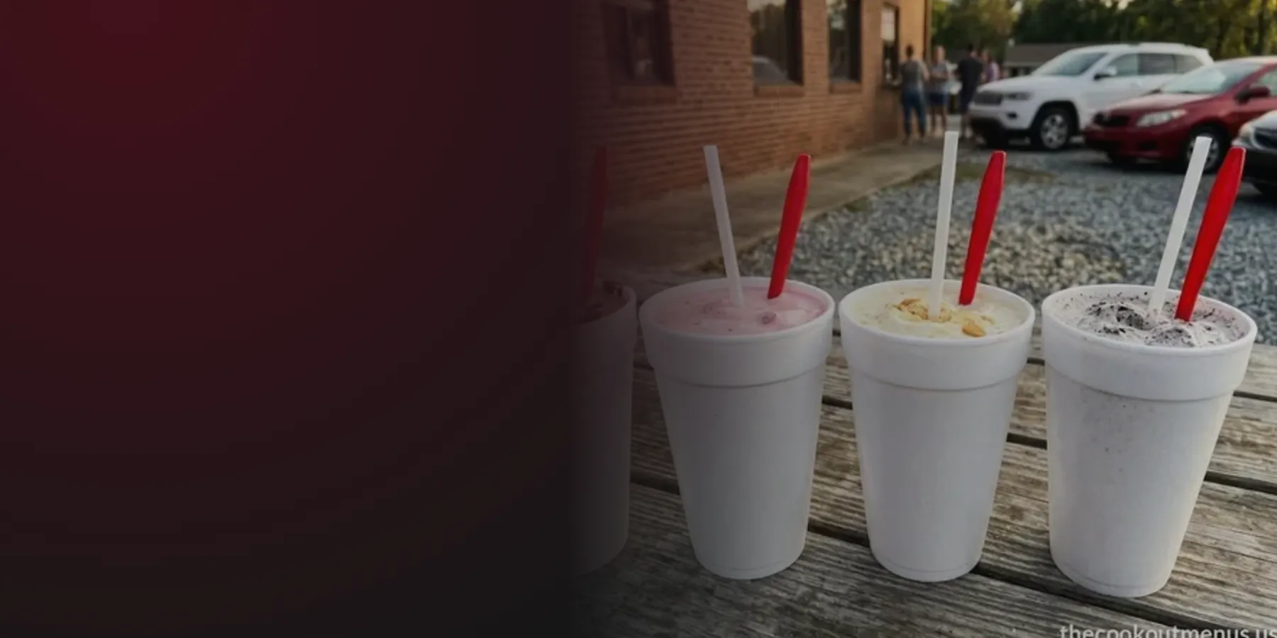 Three thick milkshakes from the Cook Out menu in foam cups with red spoons