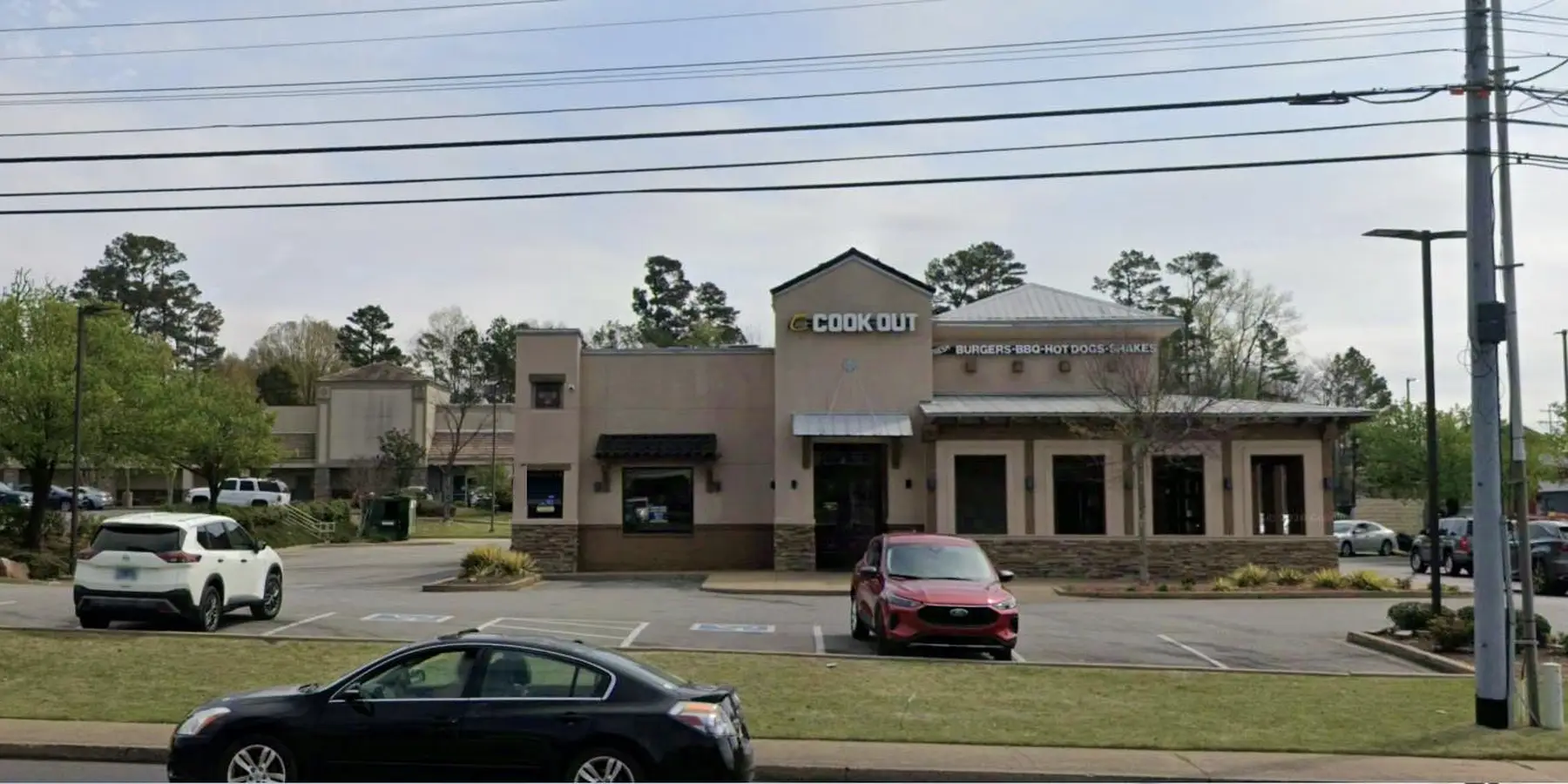 Cook Out restaurant at 4 Stonebridge Blvd in Jackson TN with a tan front, Cook Out sign and Burgers BBQ Hot Dogs Shakes sign